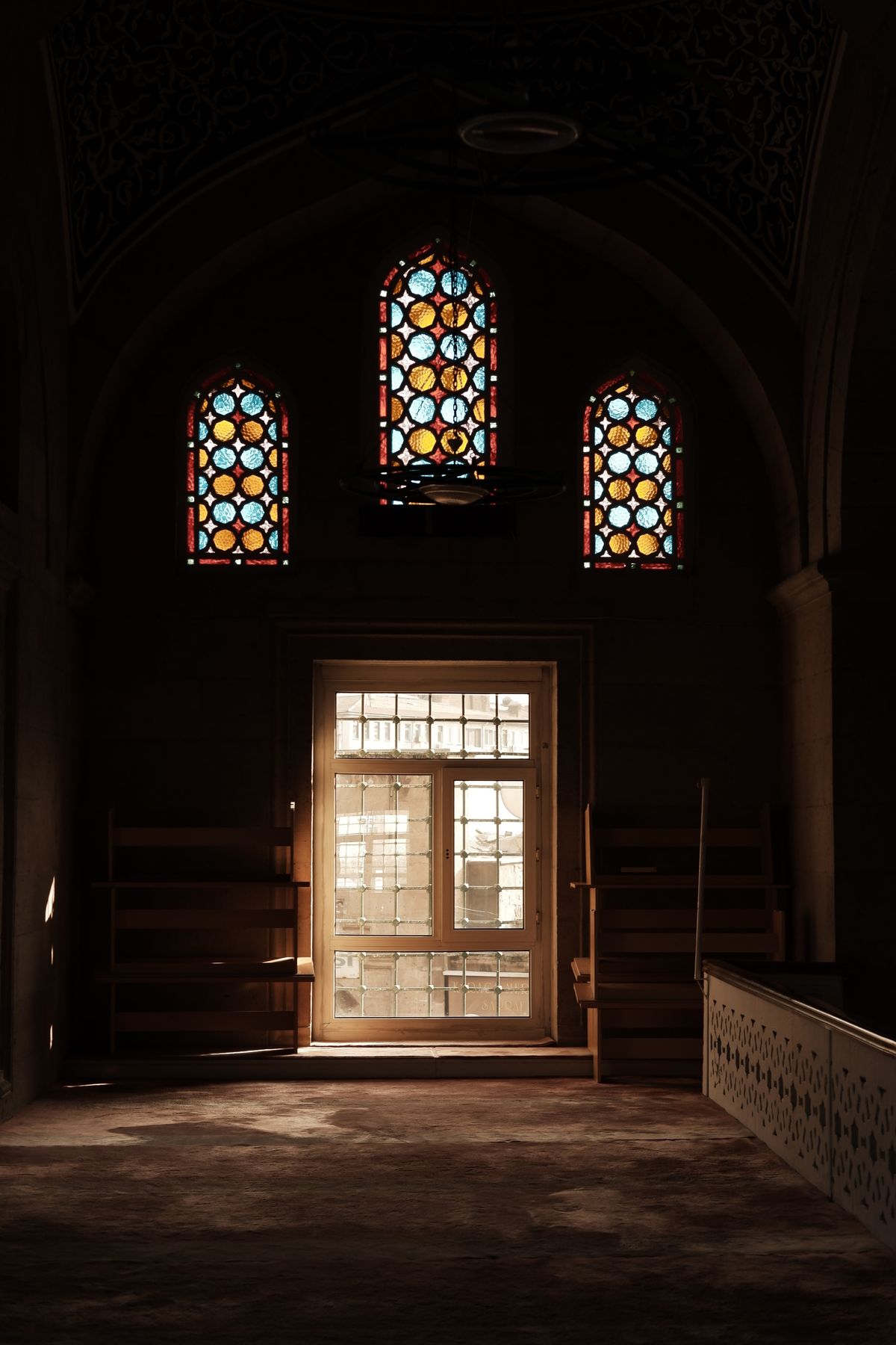 Light coming through a doorway inside a mosque